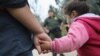FILE - U.S. Border Patrol agents take Central American immigrants into custody near McAllen, Texas, Jan. 4, 2017.