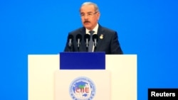 FILE - Dominican Republic President Danilo Medina speaks at the opening ceremony for the first China International Import Expo (CIIE) in Shanghai, China, Nov. 5, 2018. 