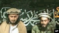 FILE - Humam Khalil Abu Mulal al-Balawi (r) and Hakimullah Mehsud, the new leader of the Taliban in Pakistan.