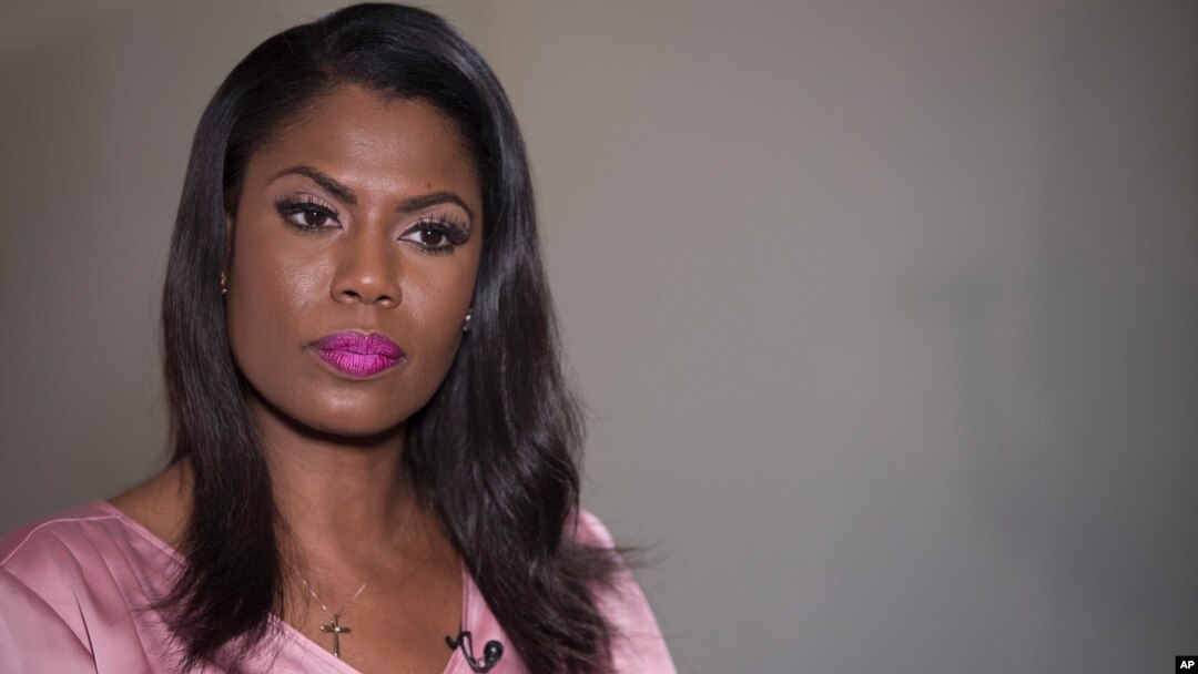 Former White House staffer Omarosa Manigault Newman listens during an interview with The Associated Press, Aug. 14, 2018, in New York.