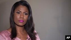 Former White House staffer Omarosa Manigault Newman listens during an interview with The Associated Press, Aug. 14, 2018, in New York.