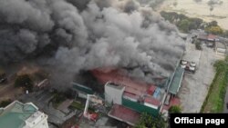 ဂန္ဓမာကုန်တိုက် မီးလောင်နေသည့်မြင်ကွင်း ( အေပြီလ ၁၊ ၂ဝ၂၁)