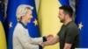 FILE - Ursula von der Leyen, left, President of the European Commission, shakes hands with Ukrainian President Volodymyr Zelenskyy, following a joint press conference in Kyiv, Ukraine, Sept. 20, 2024. 