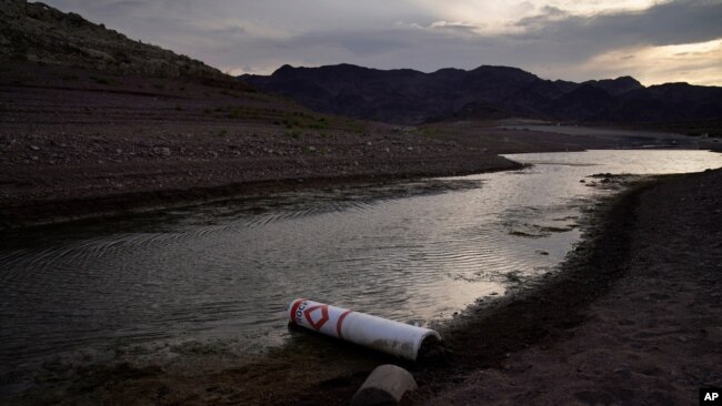 Water levels at Lake Mead, seen in this Aug. 13, 2021, photo, have dropped so low that the lake's bottom is exposed. The low level also exposed a barrel on the lake floor containing the remains of a person police estimate died more than 40 years ago.