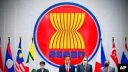 President Joko Widodo, center, accompanied by other Indonesian officials, delivers a press statement following a meeting of ASEAN leaders at the ASEAN Secretariat in Jakarta, Indonesia, April 24, 2021. (Courtesy Indonesian Presidential Palace)