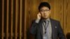 FILE - Kim Ju Song, a member of the North Korean delegation, listens to a panel discussion about human rights abuses in North Korea at U.N. headquarters in New York, Oct. 22, 2014.