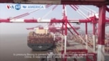 VOA60 America - US tariffs on Chinese goods go into effect, China responds with its tariffs