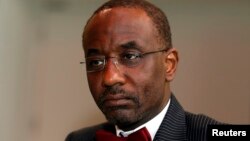 FILE - Nigeria's central bank governor Sanusi Lamido Sanusi attends an interview with Reuters at the World Islamic Economic Forum in London, October 30, 2013.