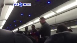 VOA60 America - Three men and a woman of apparent Middle Eastern descent removed from a Chicago-bound flight