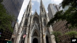 FILE - This Sept. 6, 2018, photo shows St. Patrick's Cathedral in New York. A New Jersey man has been arrested outside the cathedral with two jugs of gasoline.