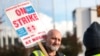 Boeing machinist Andre Johnstone, who says he does not support the new contract offer, pickets outside the Renton Production Facility one day before striking union members will vote on a new contract offer in Renton, Washington on November 3, 2024.