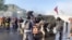 Chileans Face Down Tear Gas and Water Cannon in Anti-Government Protest 