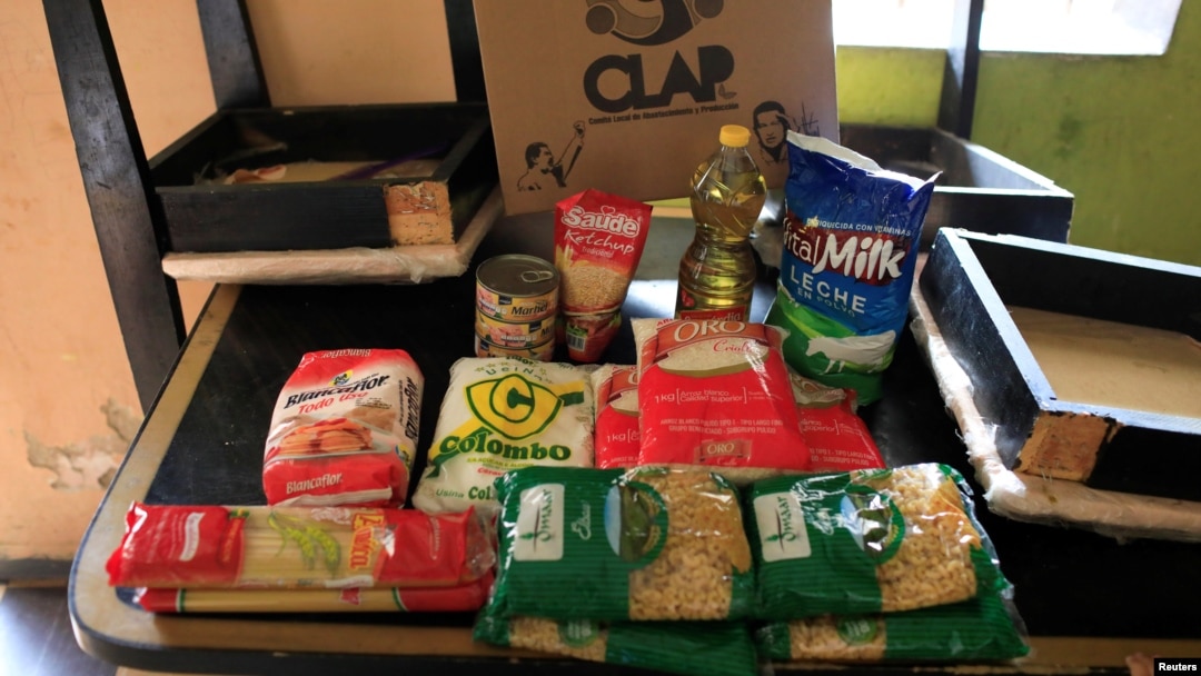 The contents of a CLAP box, a Venezuelan government handout of basic food supplies, is pictured at Viviana Colmenares' house in the slum of Petare in Caracas, Feb. 23, 2018.
