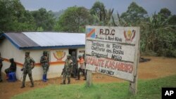 FILE—Democratic Republic of Congo Defence Forces gather in the North Kivu province village of Mukondi, March 9, 2023.