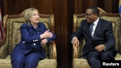 U.S.Secretary of State Hillary Clinton talks with Ethiopia's Deputy Prime Minister 