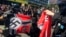 Counterprotesters tear a Nazi flag, Aug. 4, 2018 in Portland, Ore. Small scuffles broke out as police dispersed hundreds of right-wing and self-described anti-fascist protesters.