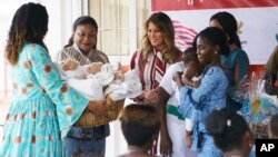 First lady Melania Trump visits with mothers and their babies at Greater Accra Regional Hospital in Accra, Ghana, Oct. 2, 2018. 