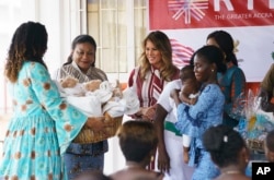 First lady Melania Trump visits with mothers and their babies at Greater Accra Regional Hospital in Accra, Ghana, Oct. 2, 2018.