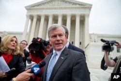 FILE - Former Virginia Gov. Bob McDonnell speaks outside the Supreme Court in Washington, April 27, 2016.