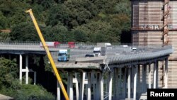 The collapsed Morandi Bridge is seen in the Italian port city of Genoa, Italy, Aug. 15, 2018. 