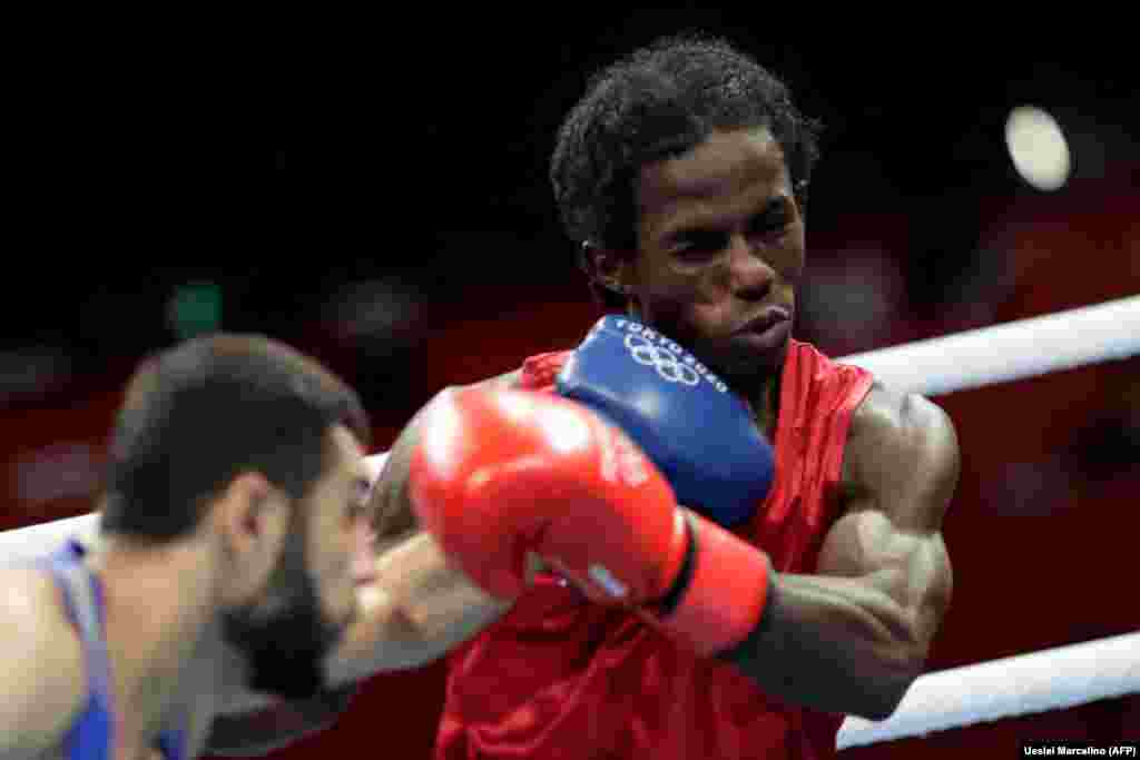 Jogos Ol&#237;mpicos 2020 - cabo-verdiano Daniel David Varela De Pina e uzbeque Shakhobidin Zoirov, no combate preliminar masculino (48-52kg). 31 de Julho 2021