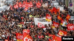 French labor union workers and students attend a demonstration against the French labor law proposal in Marseille, France, as part of a nationwide labor reform protests and strikes, March 31, 2016. 