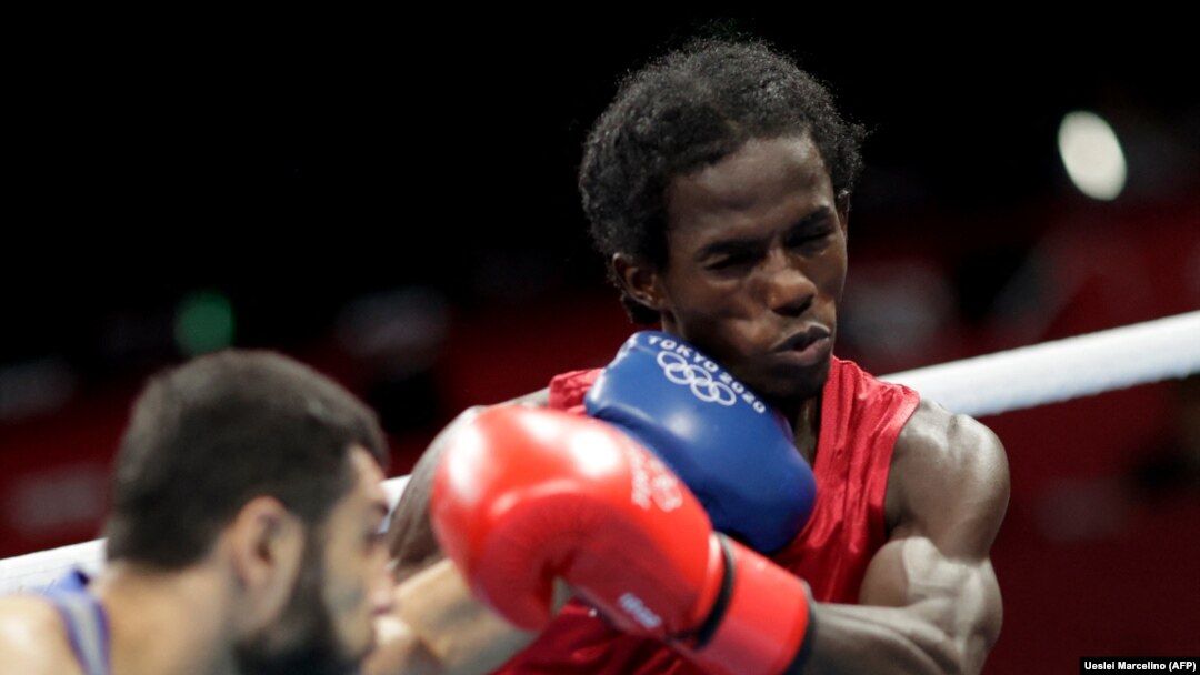 Jogos Olímpicos 2020 - cabo-verdiano Daniel David Varela De Pina e uzbeque Shakhobidin Zoirov, no combate preliminar masculino (48-52kg). 31 de Julho 2021