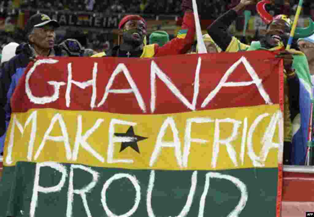 Ghana supporters cheer before the World Cup group D soccer match between Ghana and Germany at Soccer City in Johannesburg, South Africa, Wednesday, June 23, 2010. (AP Photo/Rebecca Blackwell)