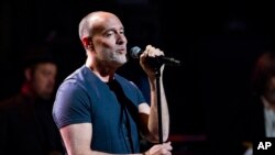 FILE - Marc Cohn performs at Love Rocks NYC! in New York. After winning a Grammy in 1991, singer-songwriter Mark Cohn charted his own course, a long winding road which led him to songs that have been Grammy nominated for two years in a row, March 9, 2017.