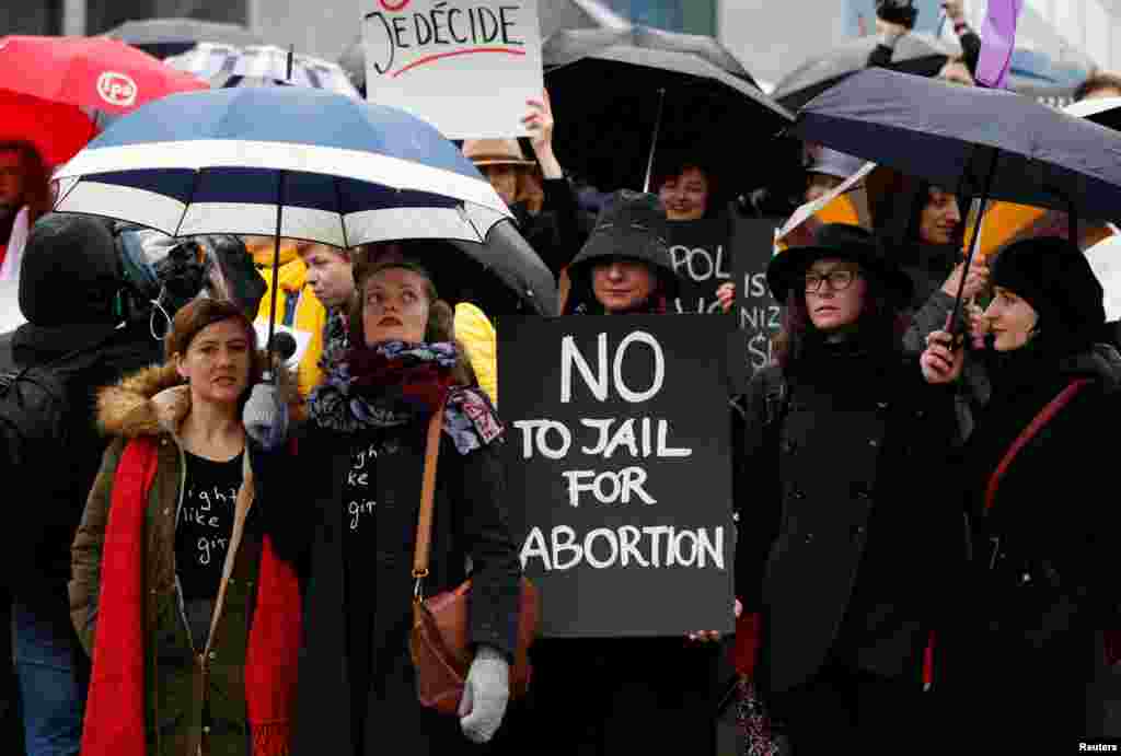 Belgian and Polish women demonstrate to call for abortion rights outside buildings of European Union institutions on International Women&#39;s Day in Brussels, Belgium, March 8, 2017.