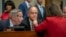 Rep. Jim Cooper, D-Tenn. (C), and Rep. Stephen F. Lynch, D-Mass. (L), confer with other Democrats as the House Oversight and Reform Committee considers whether to hold Attorney General William Barr and Commerce Sec. Wilbur Ross in contempt, June 12, 2019.