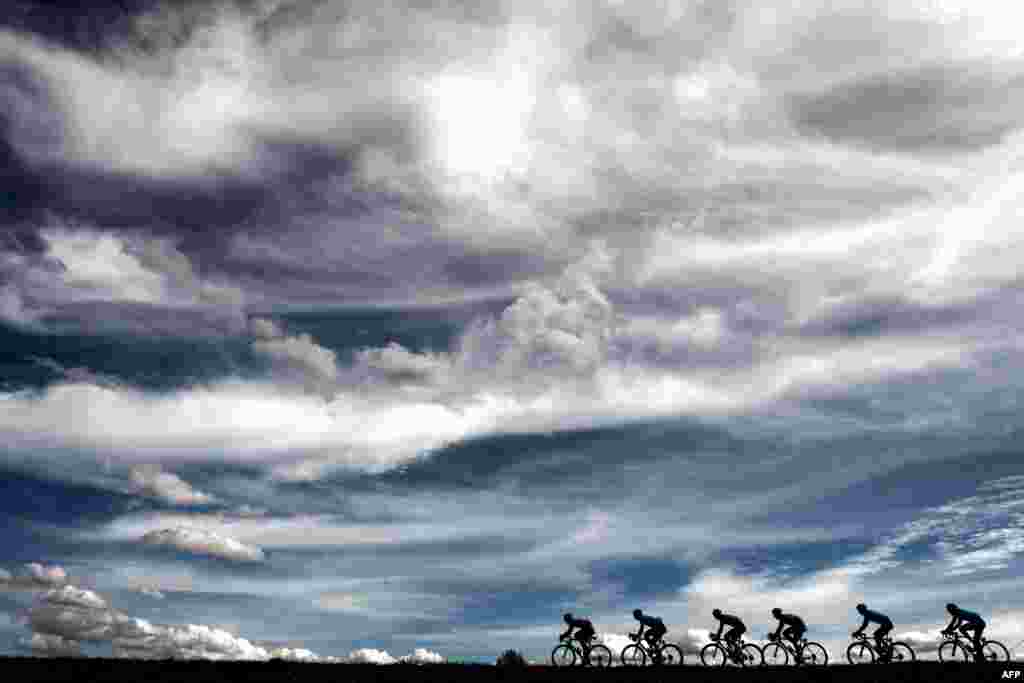 The pack rides during the 165km fifth stage of the 76th Paris-Nice cycling race between Salon de Provence and Sisteron, France.