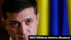 Ukraine's President Volodymyr Zelenskiy attends a news conference in Tallinn, Estonia November 26, 2019