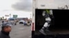 Members of Mexico's National Guard inspect a truck in line to cross the border into the United States from Mexico at the San Ysidro Port of Entry, in Tijuana, Mexico, Feb. 6, 2025.