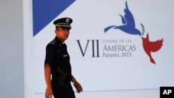 A policeman walks outside of the Atlapa Convention Center, site of the VII Summit of the Americas in Panama City, Panama, April 8, 2015. 