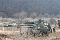 FILE - South Korean army K-9 self-propelled howitzers park in Paju, near the border with North Korea, March 24, 2021, after North Korea fired short-range missiles just days after the sister of Kim Jong Un threatened the U.S. and South Korea for holding joint military exercises.