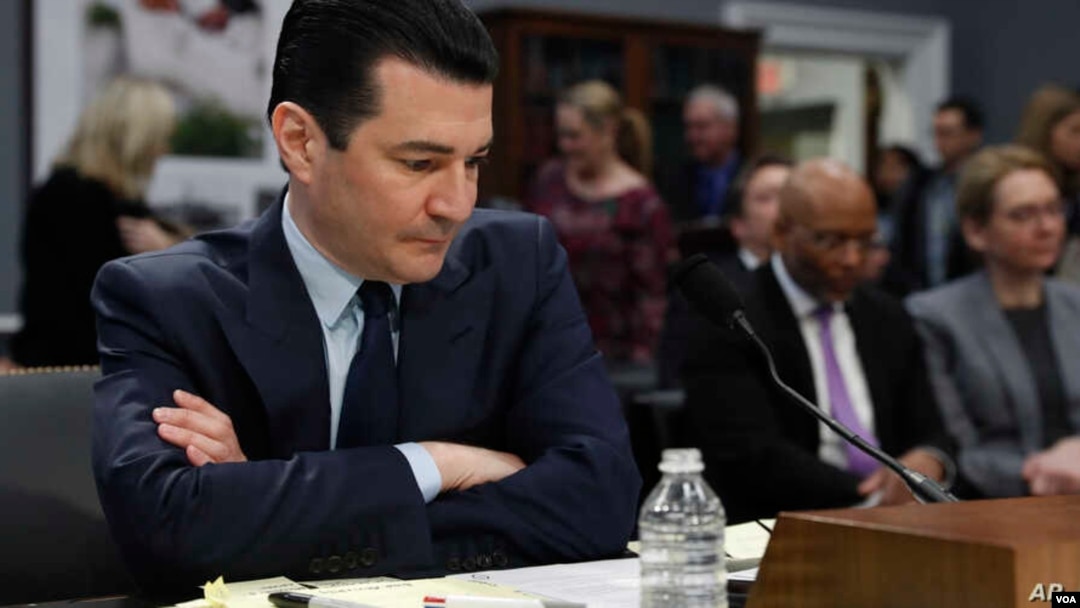  Food and Drug Administration (FDA) Commissioner Scott Gottleib looks over his notes before a House subcommittee hearing on the FDA's Status of Operations, Feb. 27, 2019, on Capitol Hill in Washington.