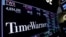 FILE - Time Warner shares are projected on a acreen above the floor of the New York Stock Exchange, New York, U.S.