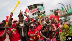 Supporters of President Uluru Kenyatta celebrate in anticipation of the announcement of the presidential election's final results, Aug. 11, 2017.