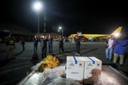 The first batch of the Pfizer-BioNTech COVID-19 vaccine arrives at the Juan Santamaria International Airport, as the coronavirus disease (COVID-19) outbreak continues, in Alajuela, Costa Rica, Dec. 23, 2020.