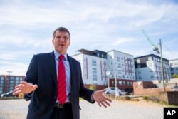 Tuscaloosa Mayor Walt Maddox talks about the off-campus student housing in the background that is seeing growth, Oct. 13, 2021, in Tuscaloosa, Alabama.