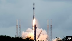 A SpaceX Falcon 9 rocket lifts off from the Cape Canaveral Space Force Station, Monday, Oct. 7, 2024 at Cape Canaveral, Fla., carrying a European spacecraft to an asteroid. (AP Photo/John Raoux)