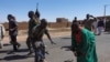 Sudan's army soldiers celebrate the army's liberation of an oil refinery in North Bahri, Sudan, Jan. 25, 2025.