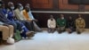 Some of the arrested Zimbabwe independence war veterans are seen at Harare Magistrates Court, in Harare, Oct. 29, 2021. (Columbus Mavhunga/VOA)