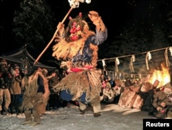 Men dressed as a deity called Namahage perform a dance during the Namahage Sedo Festival at Shinzan Shrine in Oga, Akita Prefecture, Japan, in this photo taken by Kyodo, Feb. 8, 2019.