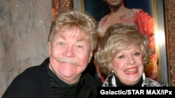 FILE - Comedian Rip Taylor (L) and a guest at the opening of "The King And I" in Hollywood, California, April 5, 2005.