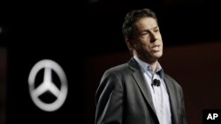 FILE - Dietmar Exler, president and CEO of Mercedes Benz USA, addresses the media during the North American International Auto show, Jan. 8, 2017, in Detroit. German business leaders are expressing concerns that President Donald Trump's 25 percent tariff on imported steel could affect the auto industry in the South. 