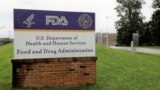 FILE - Signage is seen outside of the Food and Drug Administration (FDA) headquarters in White Oak, Maryland, Aug. 29, 2020. 