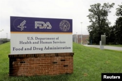 FILE - Signage sits outside the Food and Drug Administration headquarters in White Oak, Md., Aug. 29, 2020.