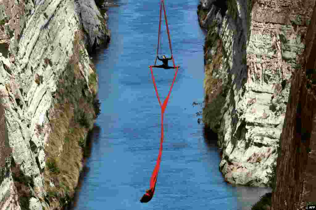 Greek choreographer and dancer Katerina Soldatou performs above the Corinth Canal, as part of the Greece Has Soul project in Corinth.